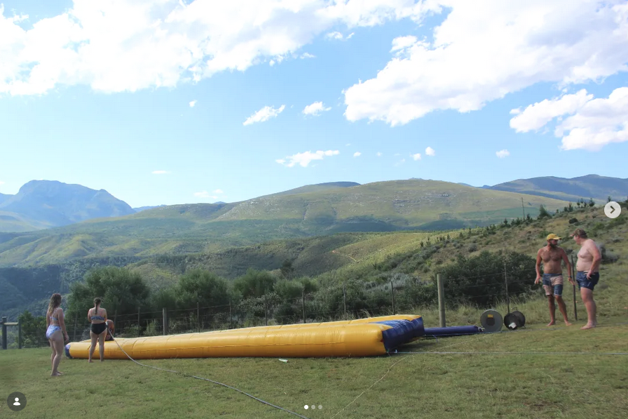 Water slide fun with mountain views